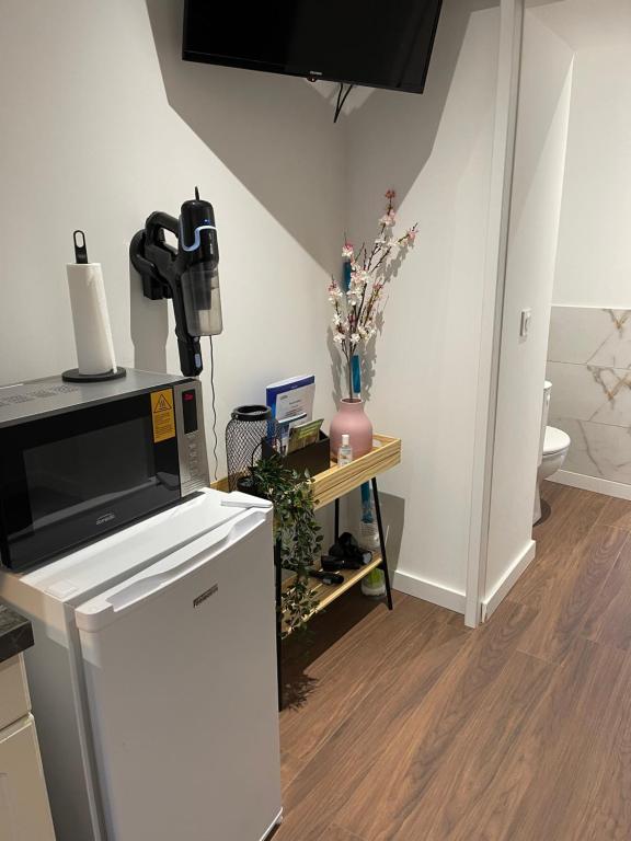 Kuchyň nebo kuchyňský kout v ubytování Les Appartements du Cep’t