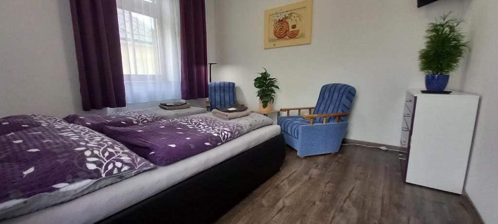 Postel nebo postele na pokoji v ubytování Apartmány u náměstí Sušice