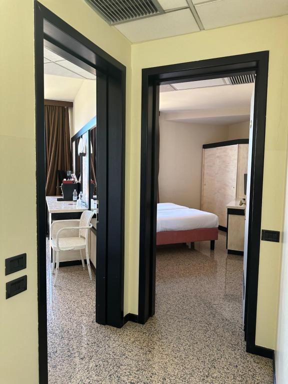Postel nebo postele na pokoji v ubytování Hotel Diamante