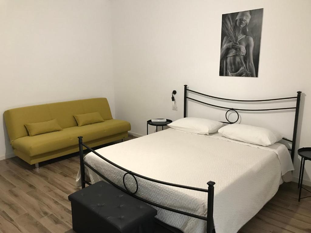 Postel nebo postele na pokoji v ubytování Latomia del Paradiso chambres et vacances