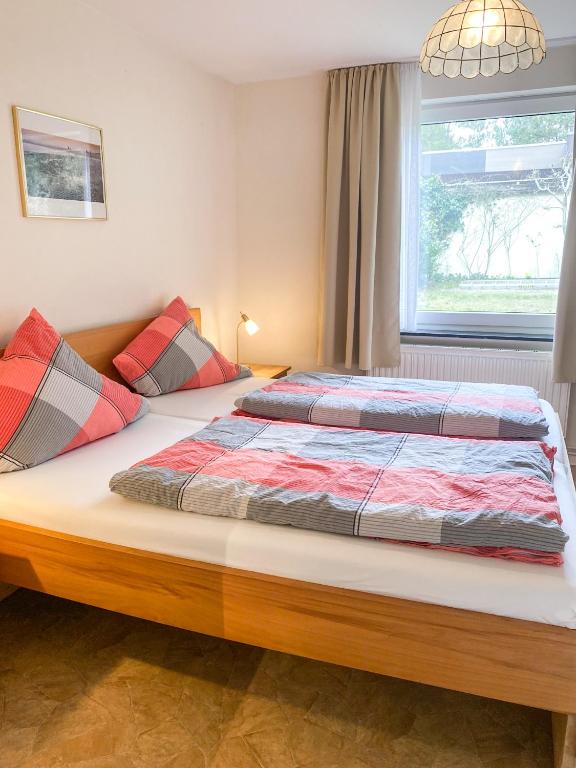 Postel nebo postele na pokoji v ubytování Hotel Garni Silvana
