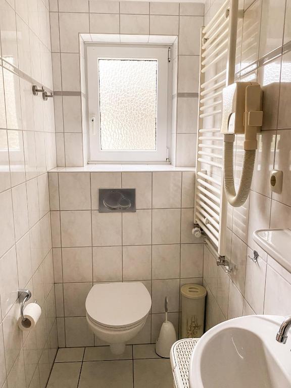 Koupelna v ubytování Hotel Garni Silvana