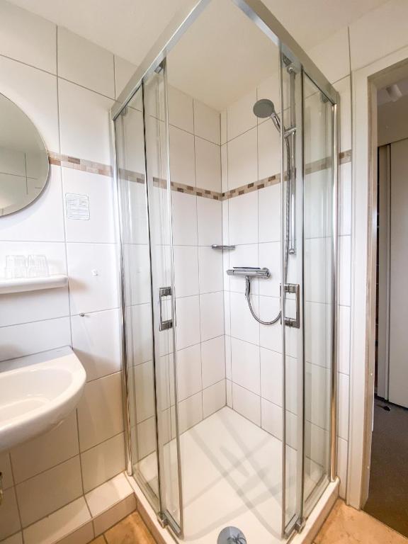 Koupelna v ubytování Hotel Garni Silvana