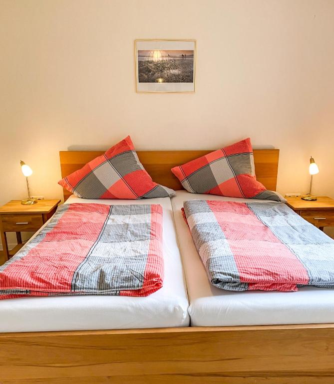 Postel nebo postele na pokoji v ubytování Hotel Garni Silvana