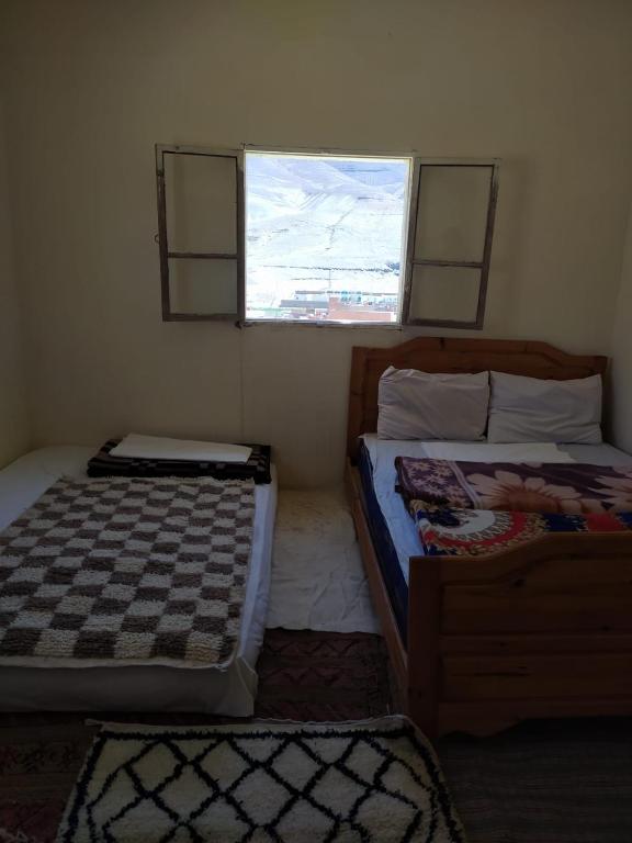 Postel nebo postele na pokoji v ubytování hotel atlas