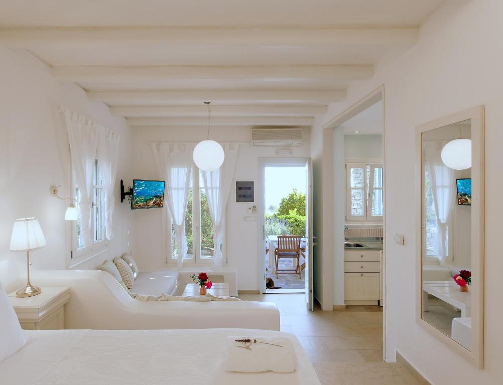 Posteľ alebo postele v izbe v ubytovaní Kavos Hotel Naxos