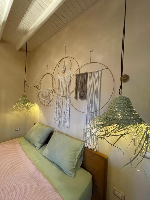Postel nebo postele na pokoji v ubytování Mannam apartment boho