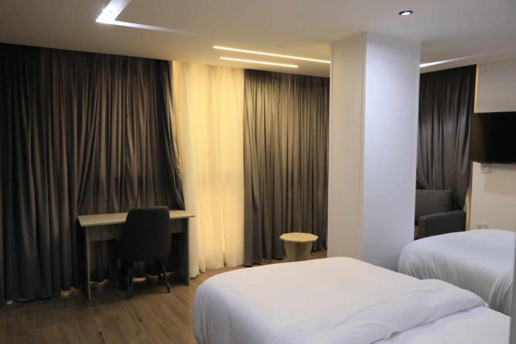 Postel nebo postele na pokoji v ubytování elhosary motel
