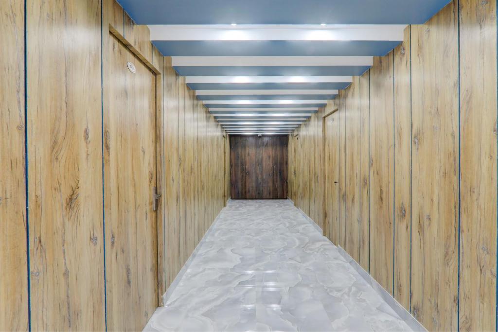 a sauna with wooden walls and a long aisle at OYO Flagship Hotel Love Inn in Lucknow