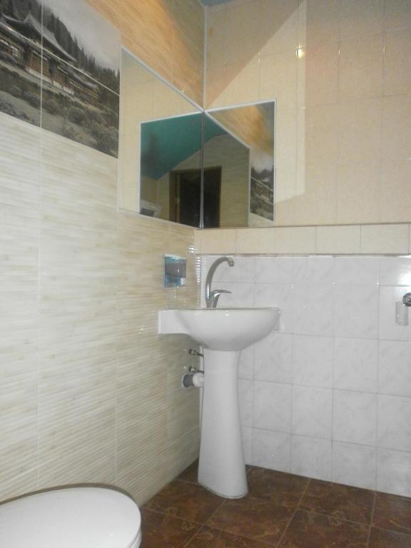 Koupelna v ubytování Kitech Guest House