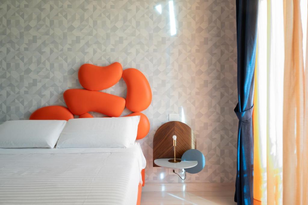 Postel nebo postele na pokoji v ubytování Palazzo Adele Rooms & Apartments