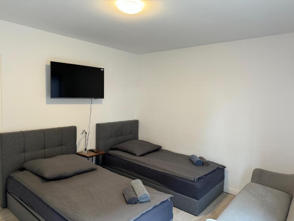 Katil atau katil-katil dalam bilik di OTTO Apartments