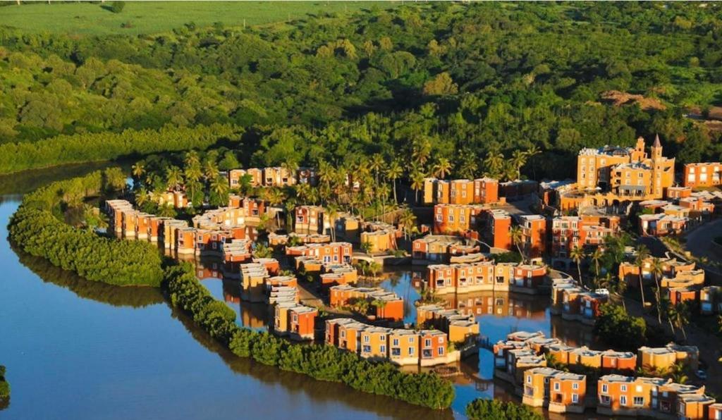 an aerial view of a city next to a river at Casa in Terre Rouge