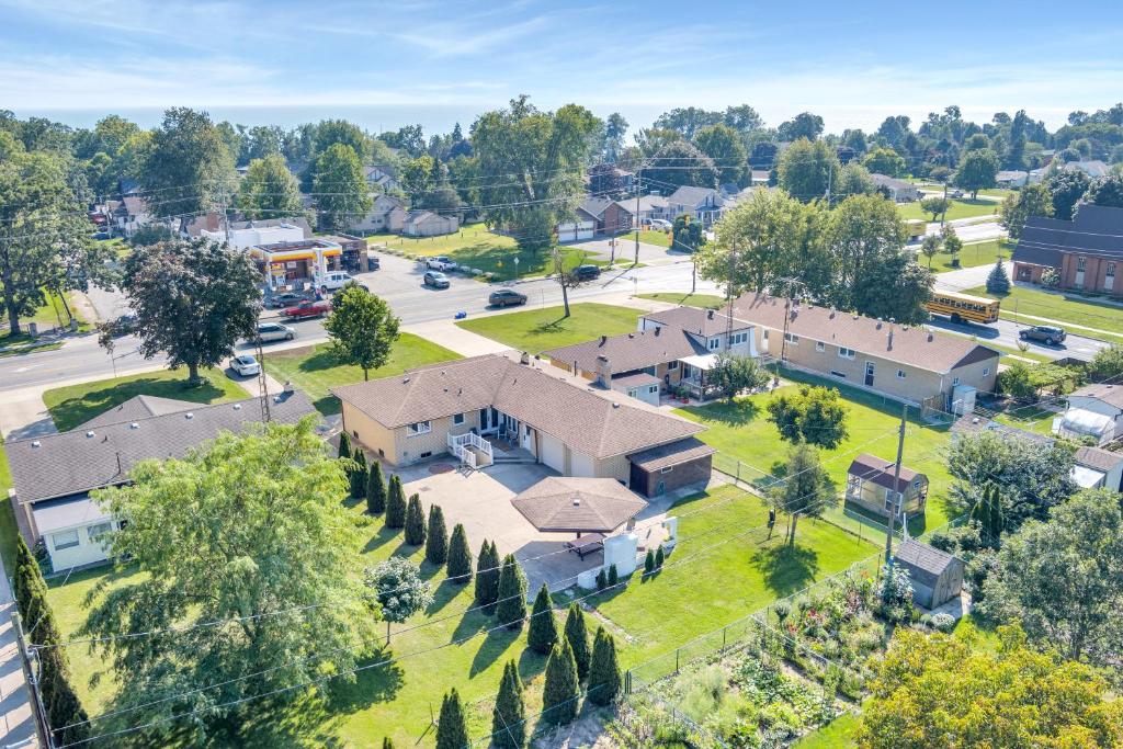 an aerial view of a house with a yard at Parkside Flat - Seacliff Beach Suites in Leamington