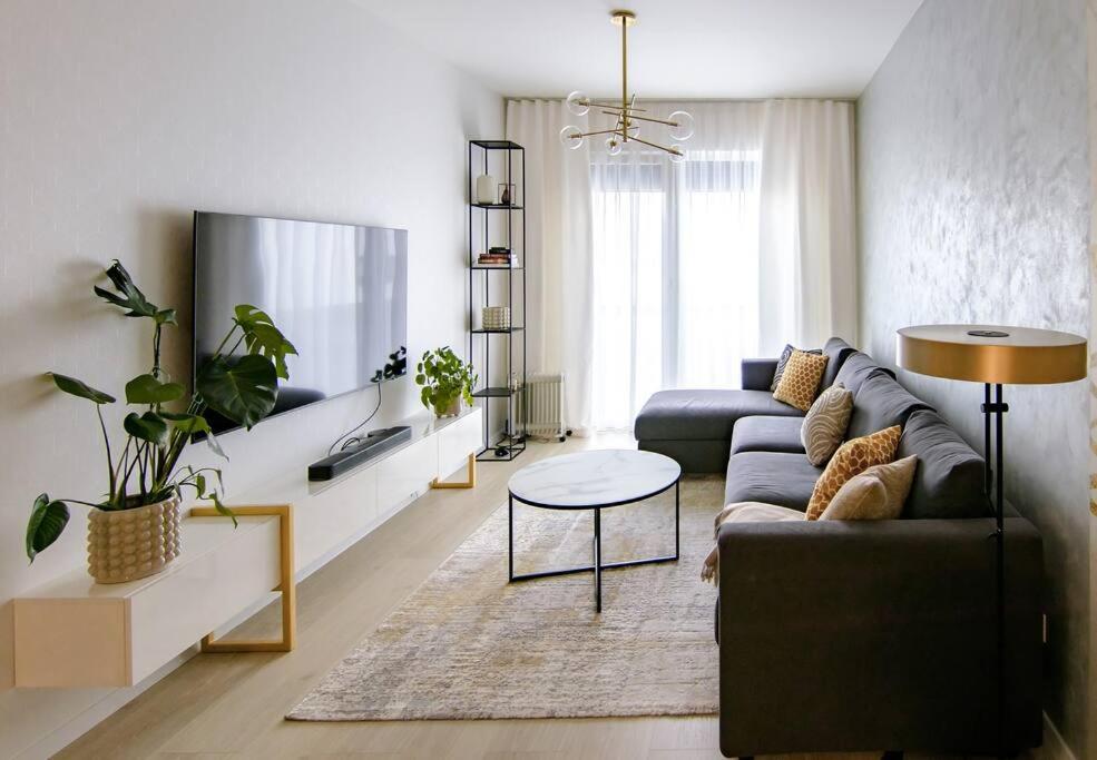 a living room with a couch and a table at Apartmán Považská Bystrica in Považská Bystrica