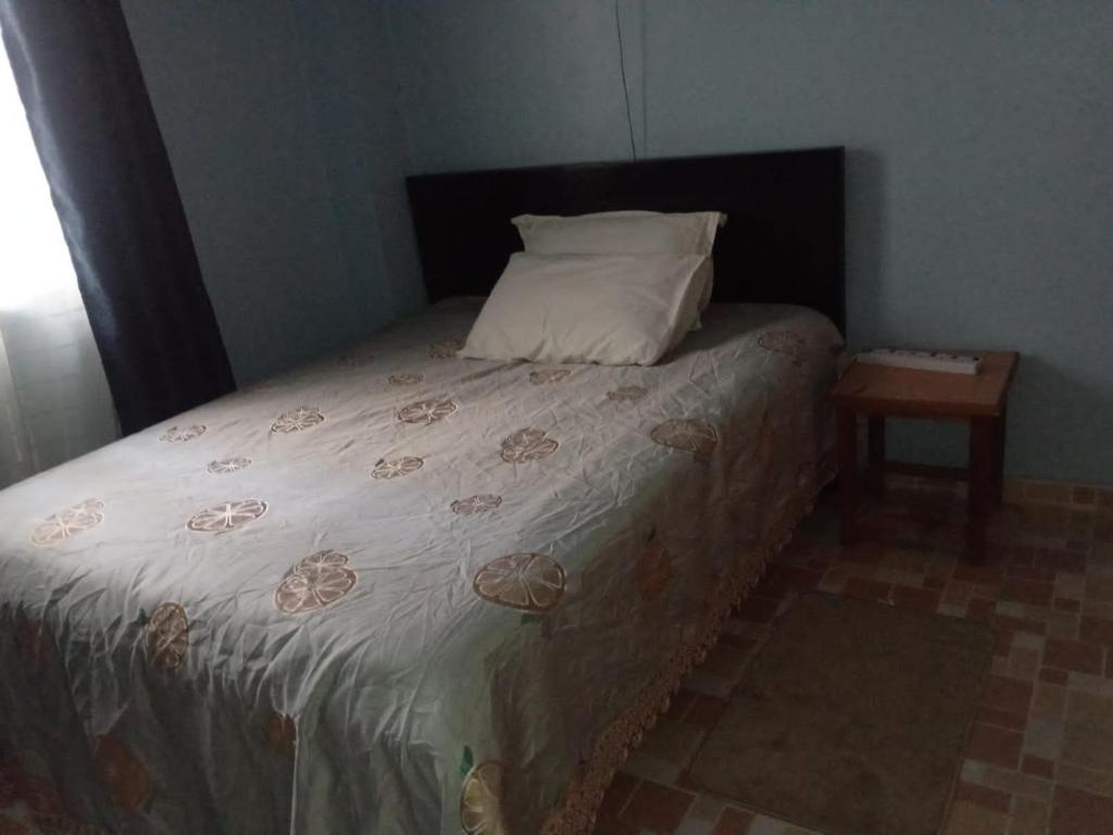 Postel nebo postele na pokoji v ubytování Tazama Airbnb