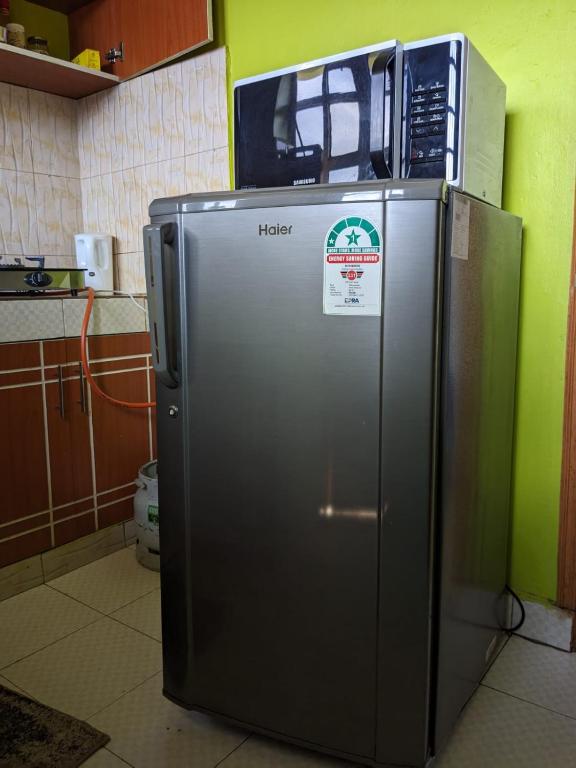 Kuchyň nebo kuchyňský kout v ubytování Tazama Airbnb