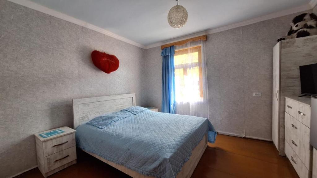 Postel nebo postele na pokoji v ubytování Guest House "SVANETI"