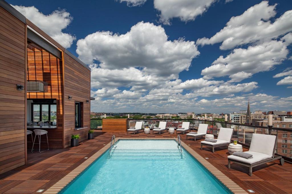 a swimming pool on the roof of a building at Viceroy Washington DC in Washington, D.C.