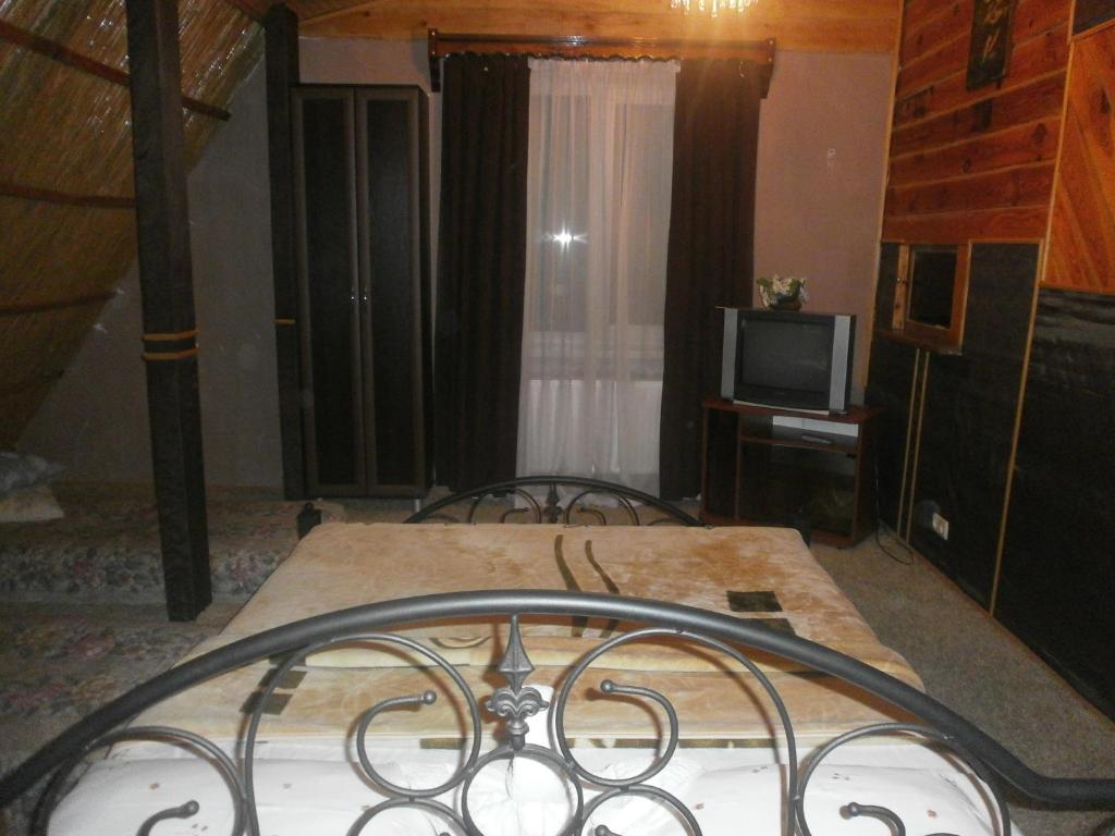 Postel nebo postele na pokoji v ubytování Kitech Guest House