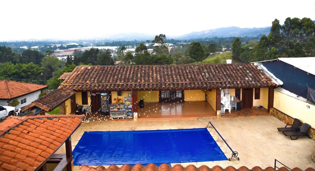 Bazén v ubytování Hostal Inn II Rionegro nebo v jeho okolí