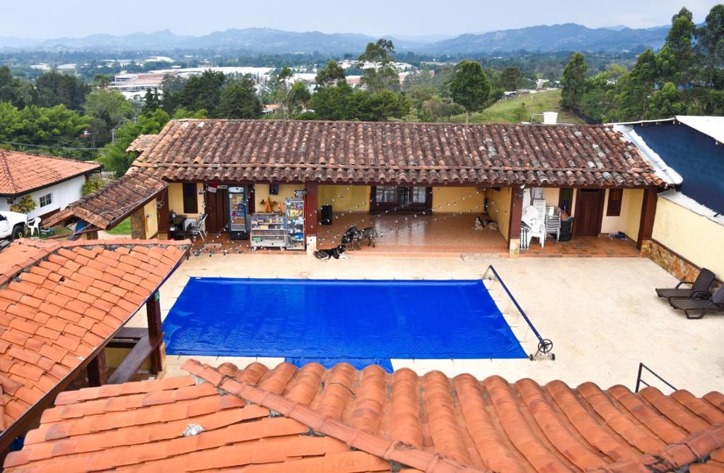 Bazén v ubytování Hostal Inn II Rionegro nebo v jeho okolí