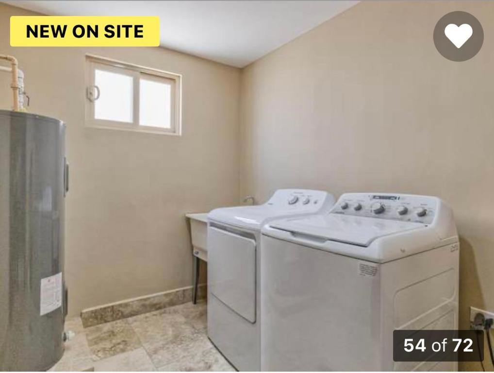 a new on site laundry room with a washer and dryer at A Coastal House for Relaxation near Golf Course And Beach Front in Puerto Peñasco