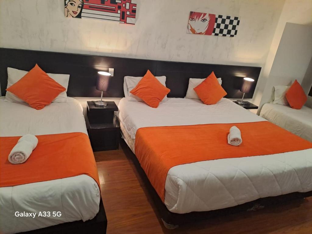 Postel nebo postele na pokoji v ubytování Hotel Classic