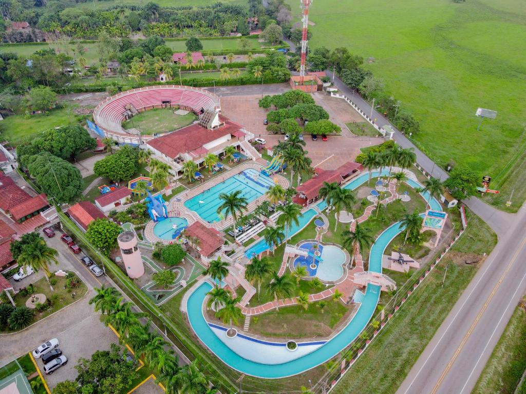 an aerial view of a water park at a resort at Hotel Sunrise By Hype in Villavicencio