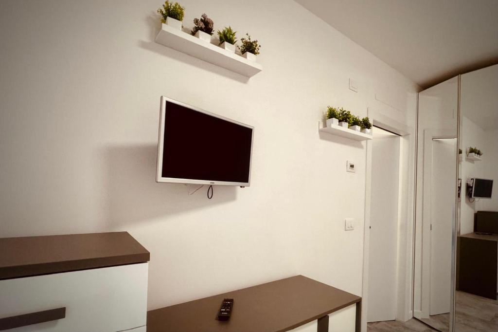 TV a/nebo společenská místnost v ubytování Maison Du Pic - Rho Fiera