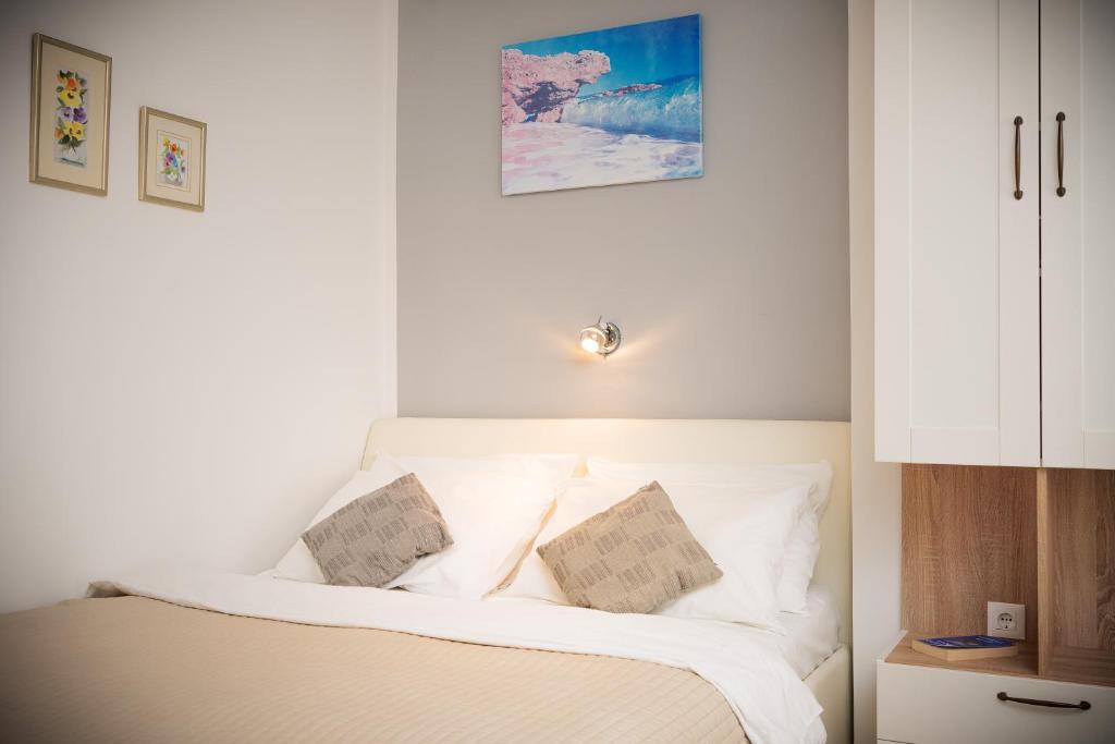 Кровать или кровати в номере Villa Rajski Dvor