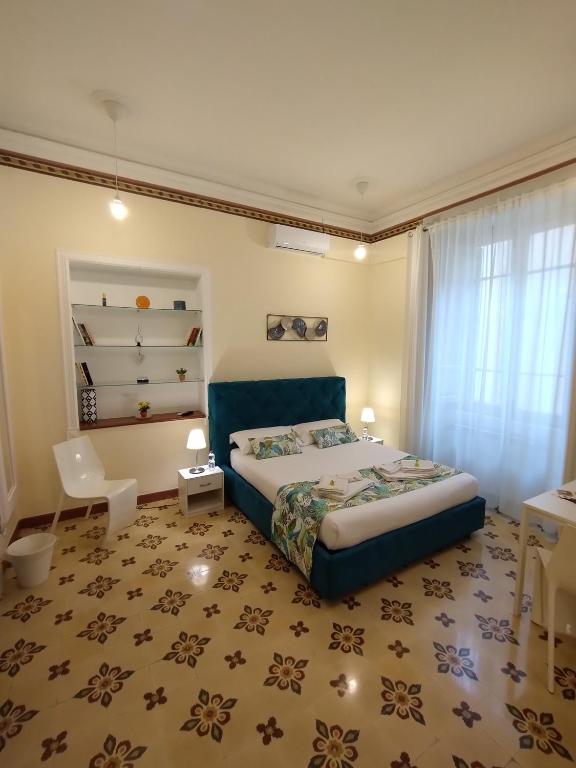 Uma cama ou camas num quarto em Suleima B&B Messina Centro