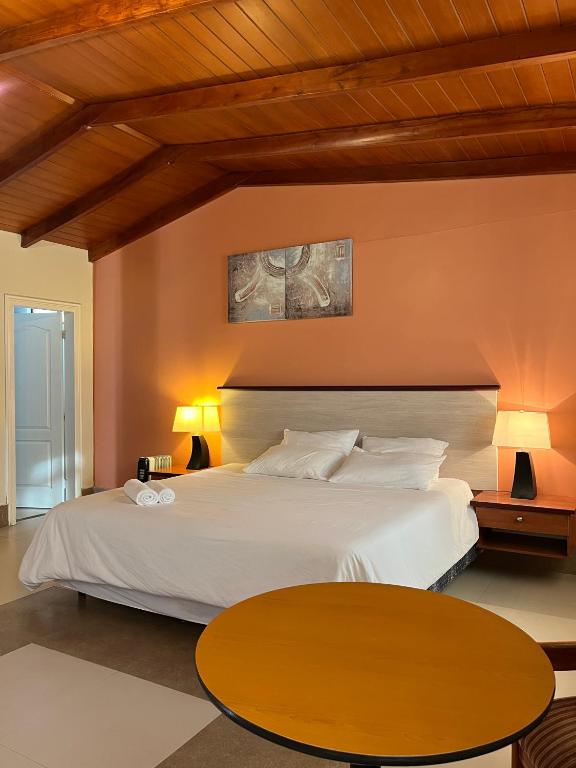 Postel nebo postele na pokoji v ubytování Minkana Hotel