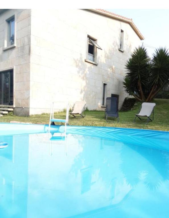The swimming pool at or close to O IGREXARIO