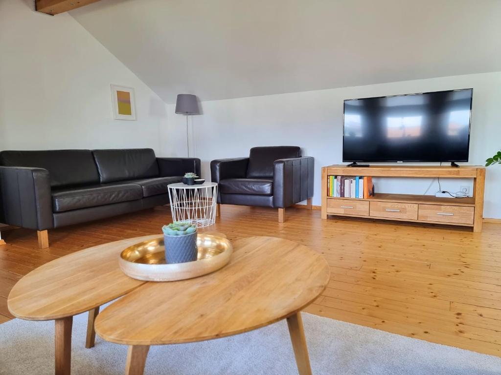 TV a/nebo společenská místnost v ubytování Ferienhaus Heckler