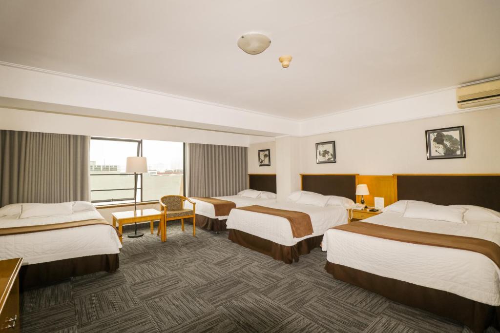 Postel nebo postele na pokoji v ubytování Hotel Miramar