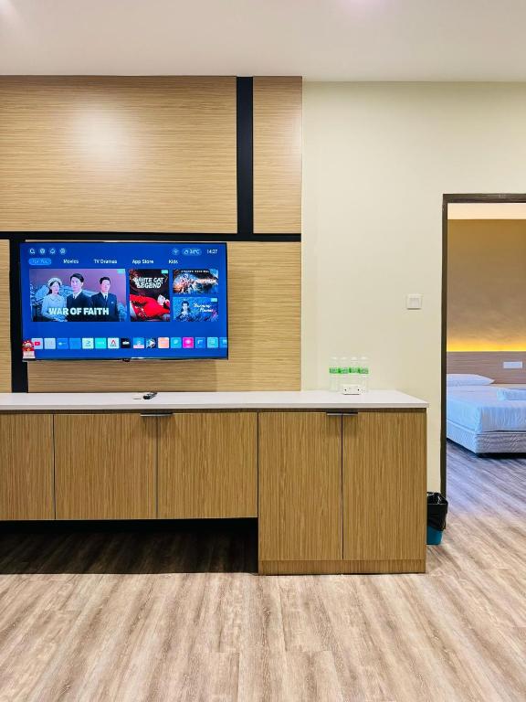 TV a/nebo společenská místnost v ubytování STAR HOTEL