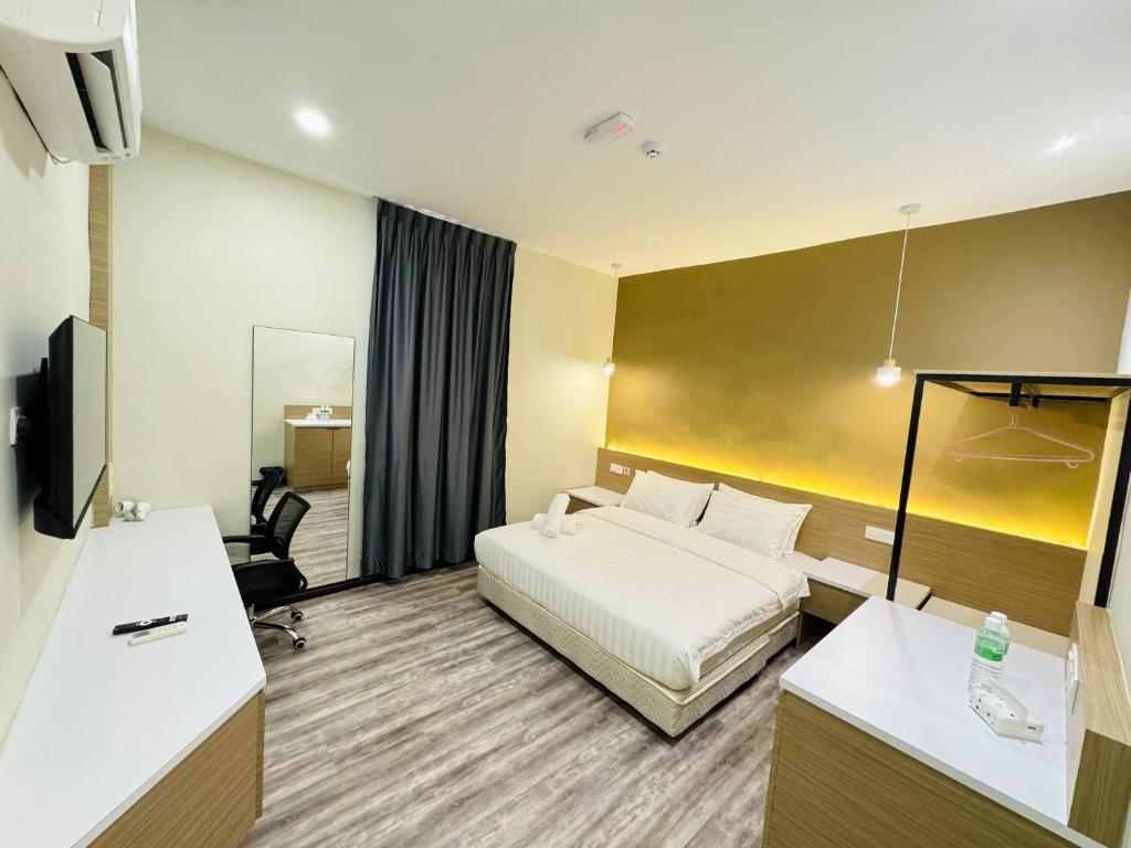 Postel nebo postele na pokoji v ubytování STAR HOTEL
