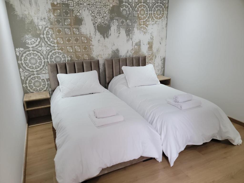 Postel nebo postele na pokoji v ubytování Eden Room SCH