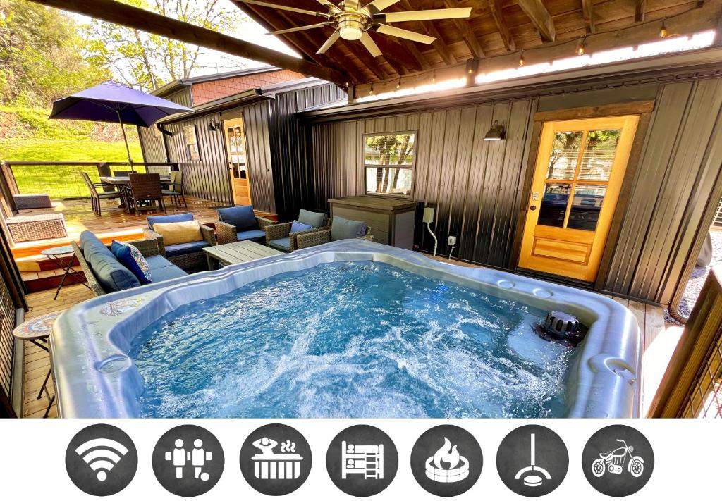 a large jacuzzi tub on the side of a house at Catons Chapel cabin in Sevierville