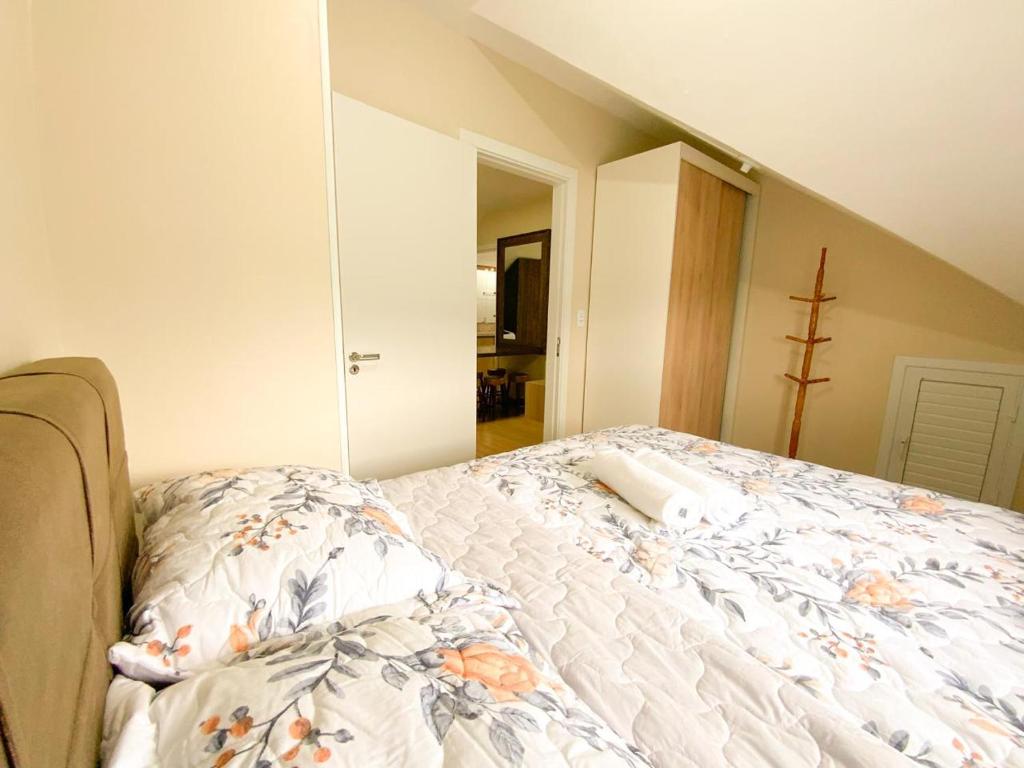 Postel nebo postele na pokoji v ubytování Aconchego do Valle