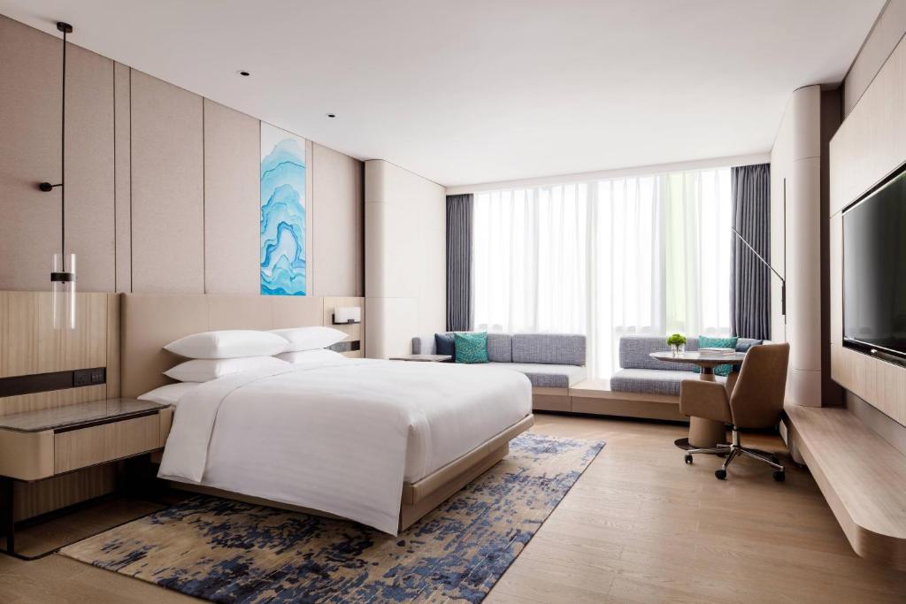 Postel nebo postele na pokoji v ubytování Courtyard by Marriott Shenzhen Northwest