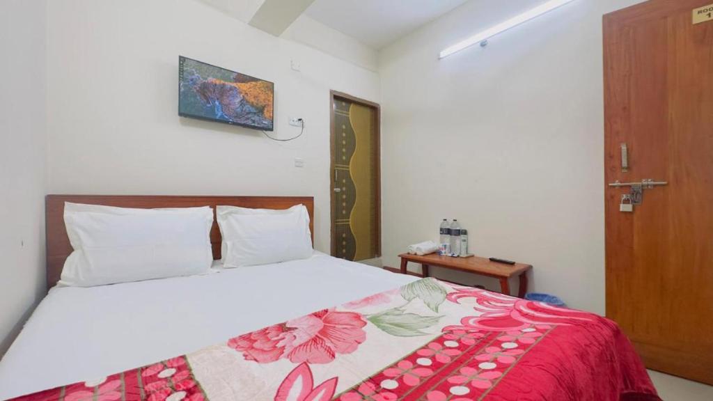 Ένα ή περισσότερα κρεβάτια σε δωμάτιο στο Hotel Rose Garden Palace Residential