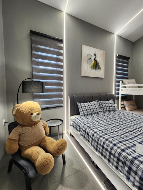 Postel nebo postele na pokoji v ubytování Ipoh Eden Pool Villa Suites