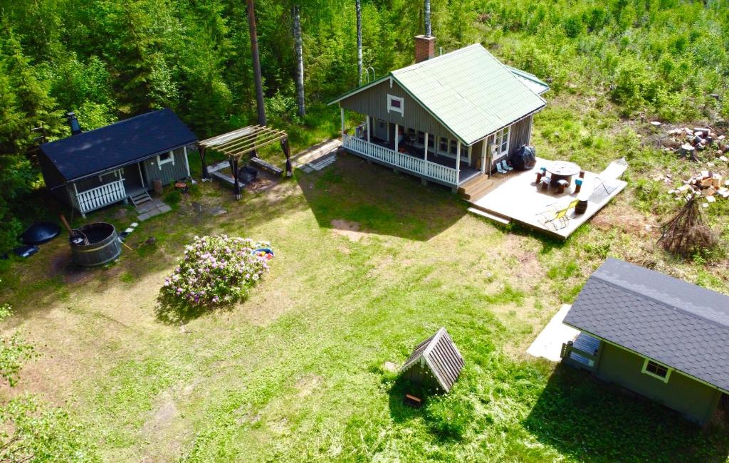 an aerial view of a small house with a yard at Villa Venekoski in Jyväskylä