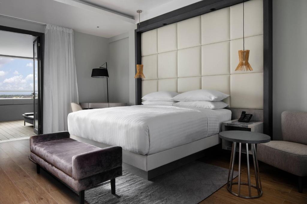 Ένα ή περισσότερα κρεβάτια σε δωμάτιο στο Lagos Marriott Hotel Ikeja