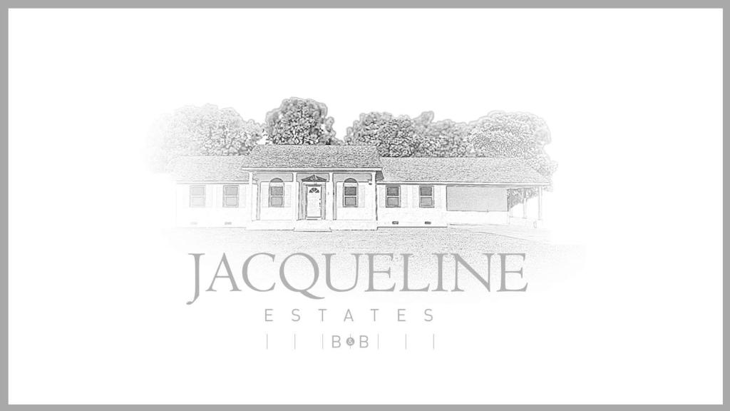 a black and white picture of a house at Jacqueline Estates B-n-B in Quinby