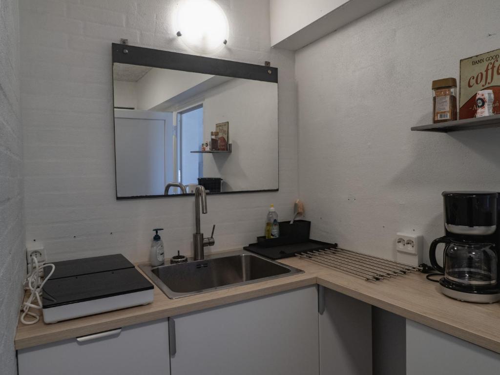 Kuchyň nebo kuchyňský kout v ubytování Solvang Apartments