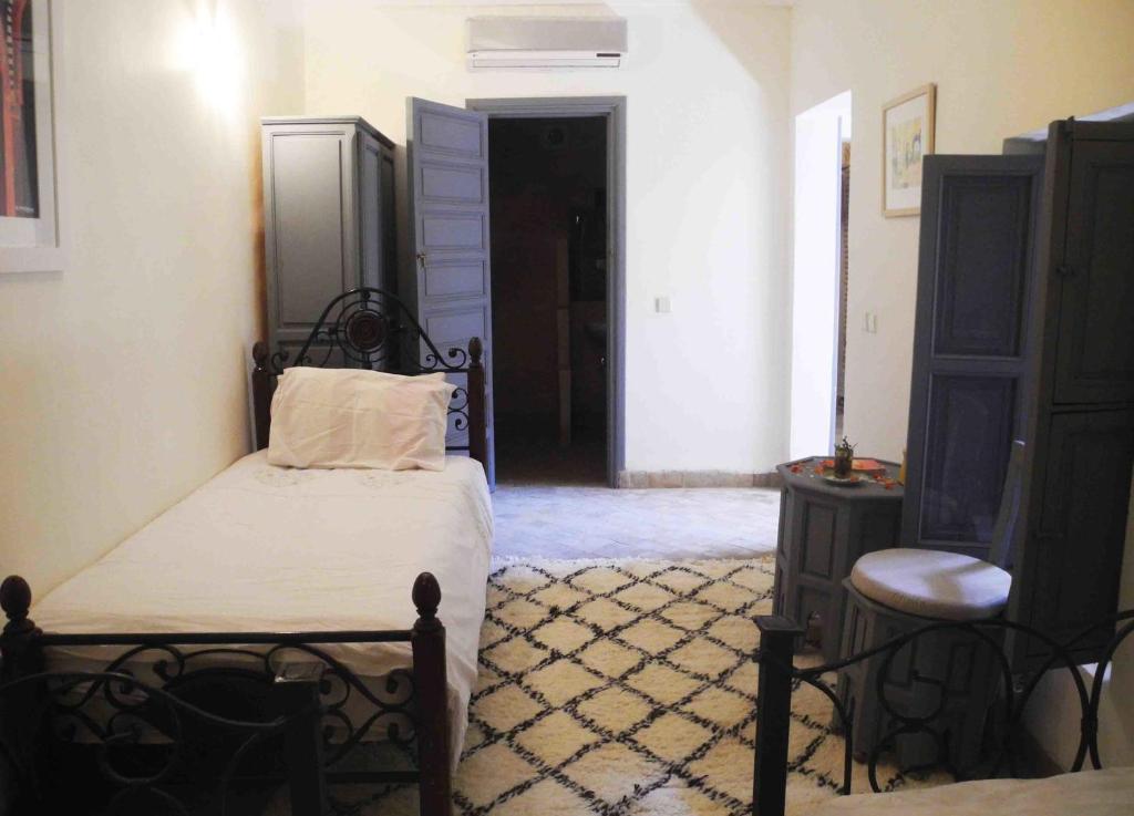 Postel nebo postele na pokoji v ubytování Riad Linda