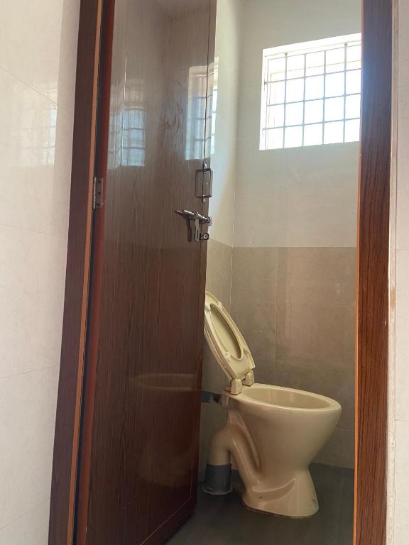 Koupelna v ubytování Glanwoods Inn - 2BHK Independent Private house in Mangalore - Pets allowed